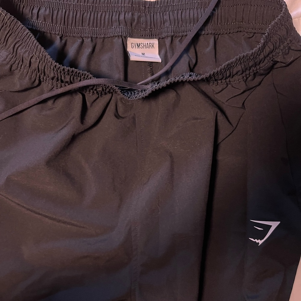 GYMSHARK Joggers, windbreaker material. Thin / Breathable, pockets, adjustable